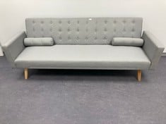 GREY SOFA BED WITH CUSHIONS AND WOODEN LEGS.