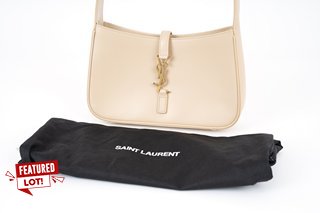 YVES SAINT LAURENT LE 5 A 7 LEATHER SHOULDER BAG IN IVORY - RRP £1,755: LOCATION - BOOTH