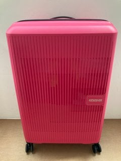 AMERICAN TOURISTER MEDIUM HARD SHELL STYLE WHEELED SUITCASE IN BRIGHT PINK: LOCATION - BR8