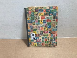 A STOCK BOOK OF VINTAGE BRITISH STAMPS: LOCATION - AR1