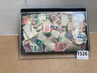 A BOX OF LOOSE VINTAGE STAMPS: LOCATION - AR1