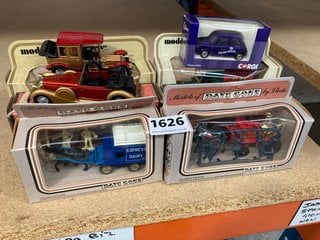 A COLLECTION OF BOXED VINTAGE DIE CAST VEHICLES: LOCATION - AR4