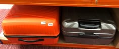 AMERICANN TOURISTER ORANGE SUITCASE & AMERICAN TOURISTER GREY SUITCASE: LOCATION - A