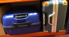 SWISS MILITARY SUITCASE & BLUE SUITCASE: LOCATION - A