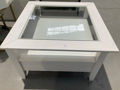 WHITE COFFEE TABLE WITH DRAWER UNIT AND GLASS TOP.