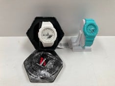 2 X WHITE AND BLUE G-SHOCK WATCH MODELS 5611 AND 5730 - LOCATION 6A.