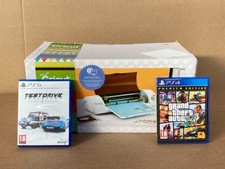 CRICUT MINI ELECTRONIC DIE CUTTING MACHINE TO INCLUDE PS4 PREMIUM EDITION GRAND THEFT AUTO GAME AND PS5 TEST DRIVE UNLIMITED SOLAR CROWN GAME (PLEASE NOTE: 18+YEARS ONLY. ID MAY BE REQUIRED): LOCATIO