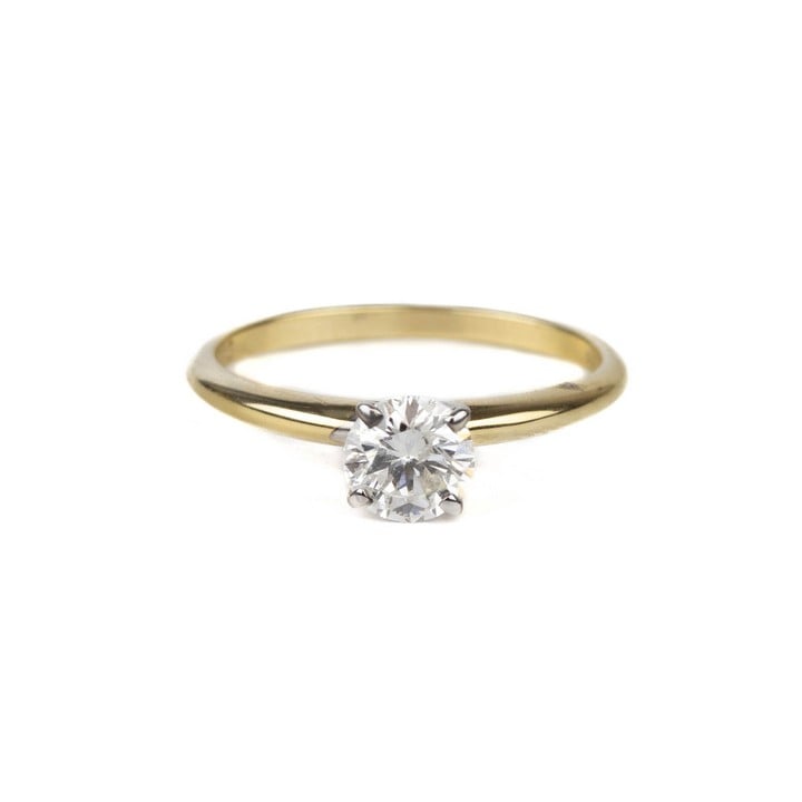 14ct Yellow and White Gold 0.60ct Diamond Solitaire Ring, Size J½, 1.7g. Colour K-L, Clarity Si2-Si3.  Auction Guide: £200-£300 (VAT Only Payable on Buyers Premium)