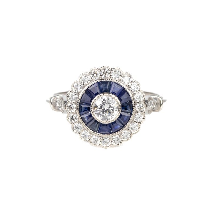 18ct White Gold 0.33ct Old-cut Diamond with Sapphire and Diamond Halo and Shoulders Ring, Size O½, 3.6g. Colour I-J, Clarity VS1-VS2.  Auction Guide: £200-£250 (VAT Only Payable on Buyers Premium)