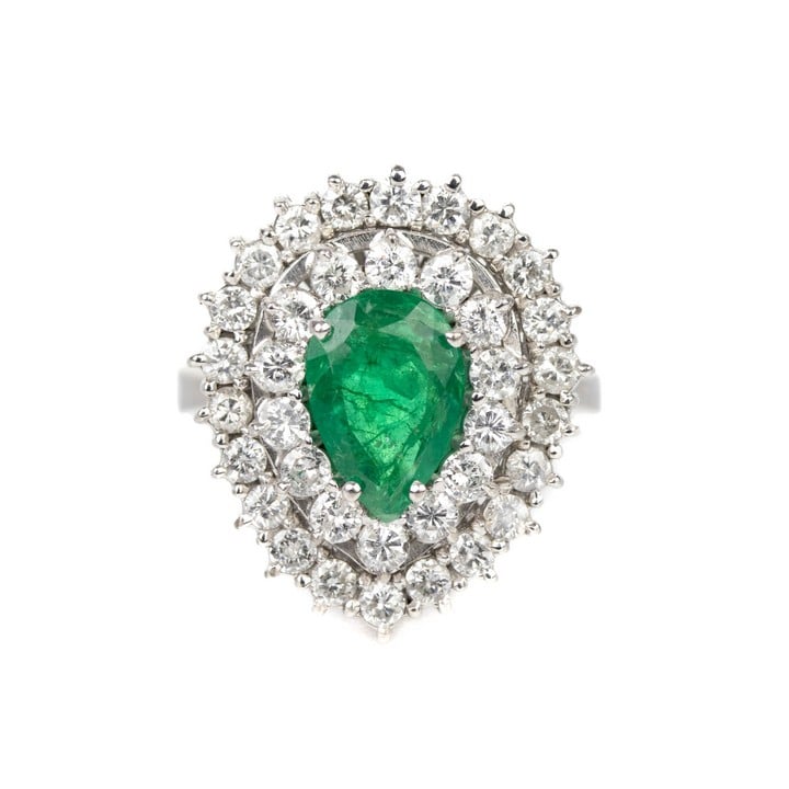 14ct White Gold 1.50ct Emerald Pear-cut with 1.36ct Diamond Double Halo Ring, Size P½, 10.4g.  Auction Guide: £450-£550 (VAT Only Payable on Buyers Premium)