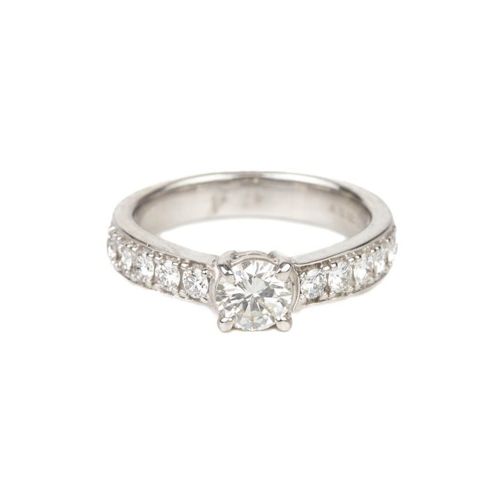 18ct White Gold 0.50ct Diamond Round Brilliant-cut with Shoulders Ring, Size K½, 4.2g. Colour I-J, Clarity Si1-Si2.  Auction Guide: £450-£550 (VAT Only Payable on Buyers Premium)