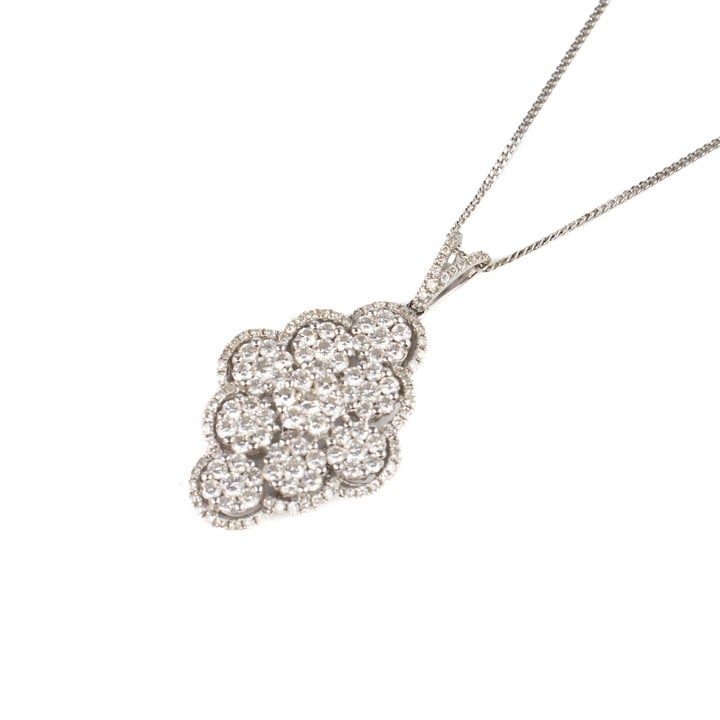 18ct White Gold 1.60ct Diamond Multi-cluster Pendant, 3.5x2cm and Fine Curb Chain, 40cm, total weight 6.9g. Colour I-J, Clarity Si1-Si2.  Auction Guide: £400-£500 (VAT Only Payable on Buyers Premium)