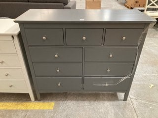 HASTINGS 9 DRAWER CHEST IN STONE GREY AND SILVER NICKEL FINISH: LOCATION - D3