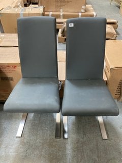 PAIR OF MODERN STYLE DINING CHAIRS IN STONE GREY FAUX LEATHER AND CHROME FINISH: LOCATION - B5