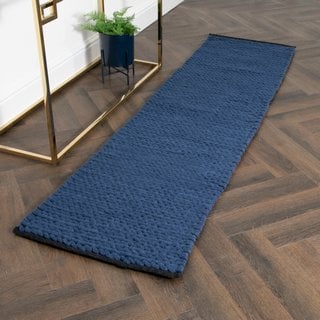 NAVY KNITTED RUNNER WOOL RUG (60 X 230CM) - RRP £196: LOCATION - C8