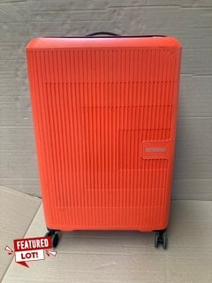 AMERICAN TOURISTER LARGE HARD SHELL STYLE WHEELED SUITCASE IN BRIGHT ORANGE FINISH: LOCATION - BR2