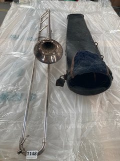 A VICTORIAN TROMBONE BY J. HIGHAM OF MANCHESTER, SILVER COLOURED WITH EXTENSIVE ENGRAVING AND LEATHER CASE (MISSING LID): LOCATION - CR