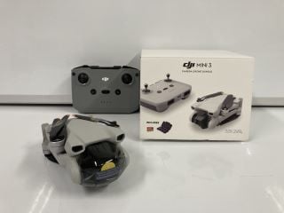 DJI MINI 3 CAMERA DRONE (ORIGINAL RRP - £339): MODEL NO MT3PD (BOXED WITH MANUFACTURE ACCESSORIES, MINOR COSMETIC WEAR ON CONTROLLER) [JPTB4519] THIS PRODUCT IS FULLY FUNCTIONAL AND IS PART OF OUR PR