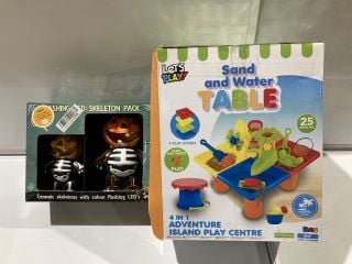 QTY OF ASSORTED ITEMS TO INCLUDE FLASHING LED SKELETON TWIN PACK, ADVENTURE ISLAND SAND AND WATER TABLE.