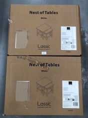 2 X LASSIC WHITE NESTED TABLES MOVED .