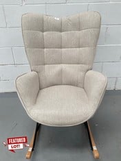 BEIGE UPHOLSTERED ROCKING CHAIR.