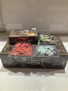 A SONG OF ICE & FIRE STARTER SET STARK VS LANNISTER GAME AND FREE FOLK ATTACHMENTS AND FREE FOLK, STARK, AND LANNISTER BANNER TOTAL RRP £182