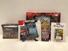 5 X PACKS OF ASSORTED CARDS INCLUDING POKÉMON PREMIUM COLLECTION FLAMIGATOREX - LOCATION 18C.