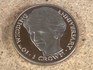 A 10TH ANNIVERSARY ROYAL WEDDING (C&D) SILVER COLOURED COIN: LOCATION - BR22