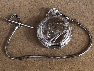 A SILVER COLOURED FULL HUNTER POCKET WATCH AND CHAIN: LOCATION - BR22