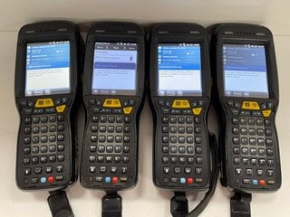 QTY OF 4 HONEYWELL DOLPHIN 99EX HANDHELD MOBILE COMPUTERS: MODEL NO 99EXLW (WITH BATTERY) [JPTM124868]