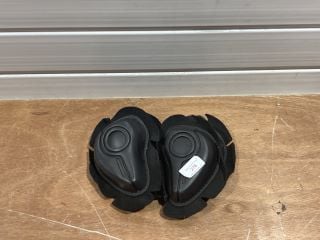 FOUR SMALL PLAIN BLACK PROTECTION PADS