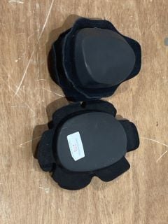 FOUR SMALL PLAIN BLACK PROTECTION PADS