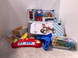 QTY OF ASSORTED JOHN LEWIS AND PARTNERS CHILDRENS TOYS TO INCLUDE MY FIRST WOODEN TRIKE AND WOODEN TEACHING CLOCK: LOCATION - B17