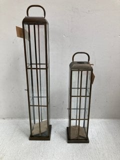 2 X NKUKU VEMULA TALL LANTERNS IN ANTIQUE BRASS FINISH: LOCATION - CR3