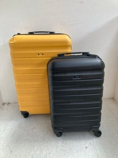 JOHN LEWIS & PARTNERS MEDIUM HARD SHELL SUITCASE IN YELLOW TO INCLUDE JOHN LEWIS & PARTNERS CABIN SIZE HARD SHELL SUITCASE IN BLACK: LOCATION - BR1