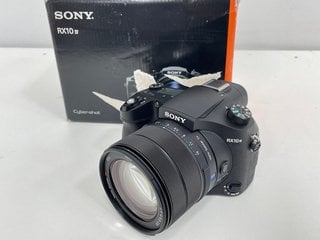 SONY RX10 IV BRIDGE CAMERA (ORIGINAL RRP - £1499). (WITH BOX, BATTERY, CHARGER, LENS CAP & HOOD) [JPTM124984]. THIS PRODUCT IS FULLY FUNCTIONAL AND IS PART OF OUR PREMIUM TECH AND ELECTRONICS RANGE