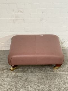 SALMON LEATHER FOOTSTOOL WITH GOLDEN WHEELS