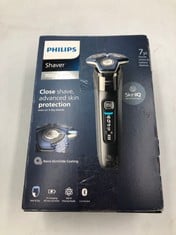 PHILIPS SHAVER SERIES 7000 - WET & DRY MENS ELECTRIC SHAVER WITH SKINIQ TECHNOLOGY, POP-UP TRIMMER, CHARGING STAND, TRAVEL CASE AND CLEANING BRUSH (MODEL S7887/35).: LOCATION - A