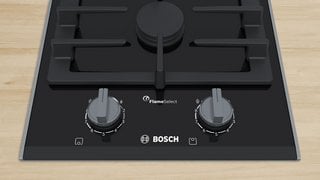 BOSCH DOMINO 30CM TWO BURNER GAS ON GLASS HOB: MODEL PRB3A6B70 - RRP £549: LOCATION - DR4