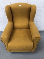 YELLOW ARMCHAIR .