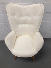 BEIGE ARMCHAIR .