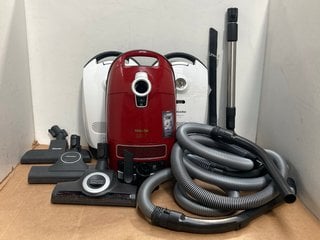 2 X MIELE CLASSIC CL FLEX VACUUMS IN WHITE TO INCLUDE MIELE COMPLETE C3 CAT & DOG FLEX VACUUM IN RED: LOCATION - G2