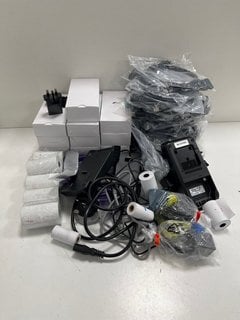 BOX OF ASSORTED ITEMS TO INCLUDE QTY OF PAY TERMINALS DOCKS, CABLES, ETHERNET CABLE AND TILL ROLLS MIXED TECH ITEMS. [JPTM125599]