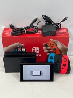 NINTENDO SWITCH 32 GB GAMES CONSOLE IN RED/BLUE: MODEL NO HAC-001 (01, BOXED WITH MARIO KART DELUXE & FIFA 19 (NO CASES) JOYCONS, REMOTE, DOCK, POWER & HDMI CABLES) [JPTM125636]