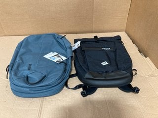 2 X THULE 24L WATERPROOF BACKPACKS IN DARK TEAL AND BLACK: LOCATION - G10