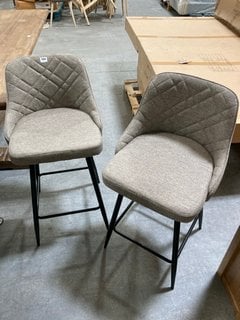 PAIR OF CONTEMPORARY STYLE UPHOLSTERED BAR STOOLS IN STONE FABRIC WITH BLACK METAL FRAME LEGS: LOCATION - B2