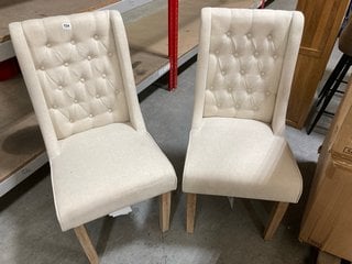 PAIR OF PADSTOW UPHOLSTERED BUTTON BACK STYLE DINING CHAIRS IN OATMEAL FABRIC AND NATURAL WOOD LEGS: LOCATION - B3