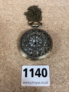 A FILIGREE POCKET WATCH AND CHAIN: LOCATION - CR