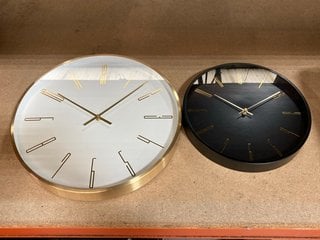 METAL WALL CLOCK IN GOLD AND WHITE FINISH TO INCLUDE METAL WALL CLOCK IN BLACK AND GOLD FINISH: LOCATION - BR13