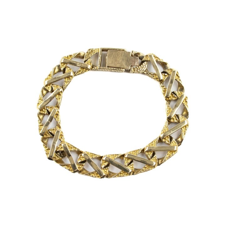 9ct Yellow Gold Patterned Curb Bracelet, 44.2g.  Auction Guide: £600-£800 (VAT Only Payable on Buyers Premium)